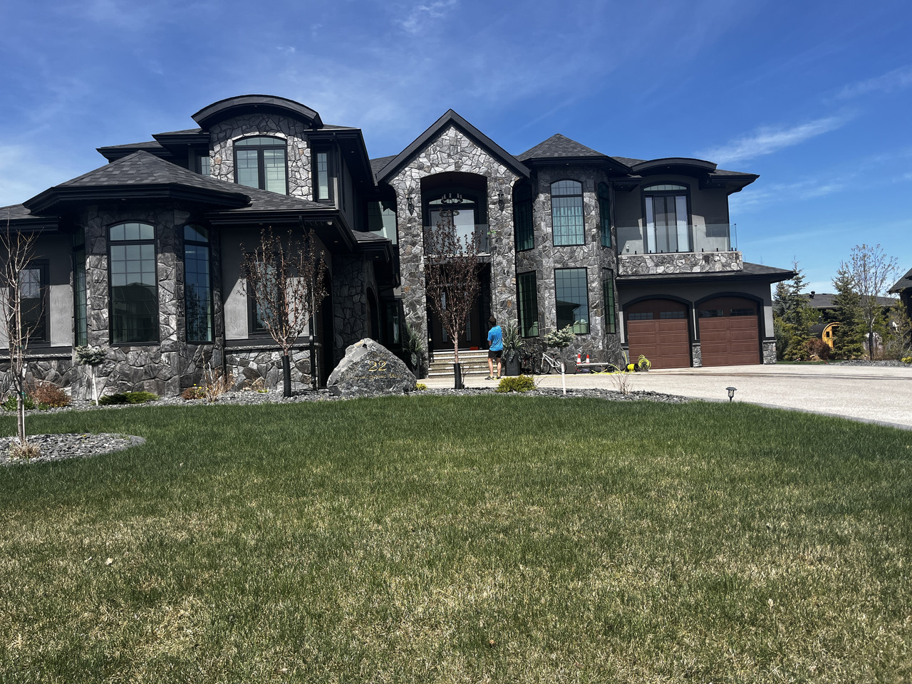 Custom home exterior windows cleaned by Clarity Co. in Calgary