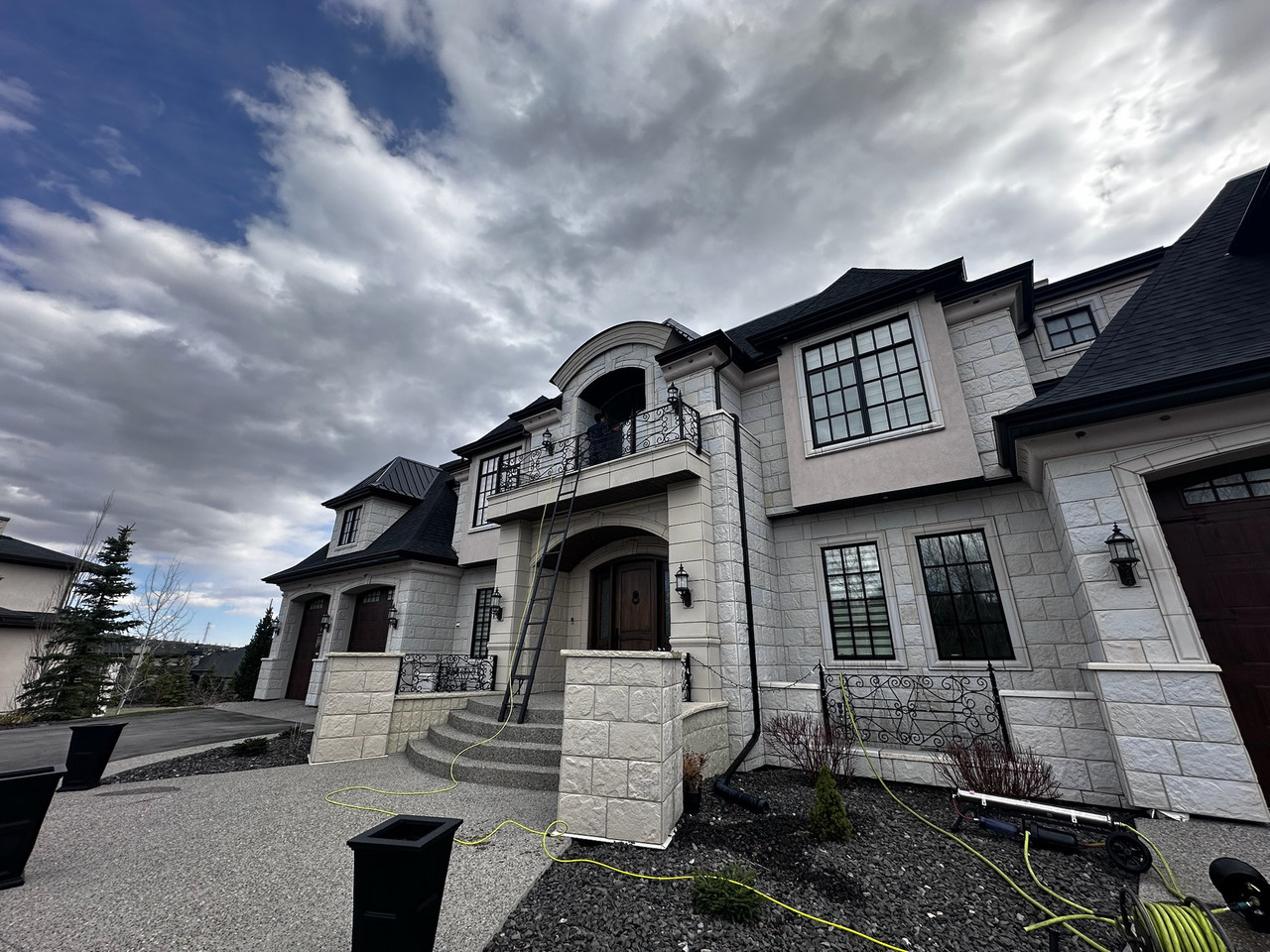 Custom home exterior windows cleaned by Clarity Co. in Calgary